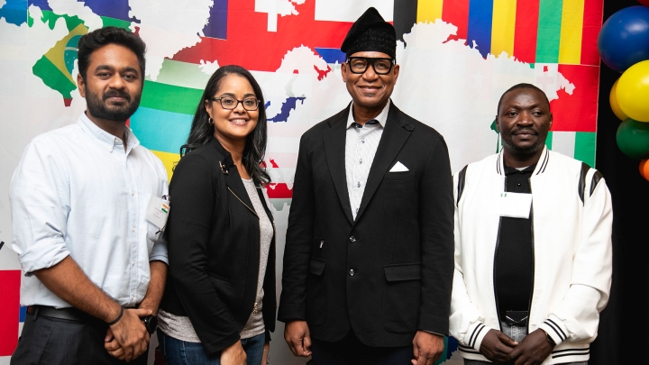 Chancellor Tillis poses with international students